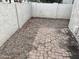 Small private patio area with gravel and brick at 3120 N 67Th Ln # 42, Phoenix, AZ 85033