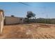 Large backyard with dirt and a shed at 3641 W Garfield St # Frnt, Phoenix, AZ 85009