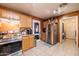 Kitchen with a stainless steel refrigerator and tile flooring at 37116 W Amberwood --, Tonopah, AZ 85354