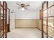 Bedroom with French doors and neutral carpeting at 3837 W Port Au Prince Ln, Phoenix, AZ 85053