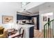 Modern kitchen with dark blue cabinetry and stainless steel appliances at 428 N Mahogany Ct, Gilbert, AZ 85233