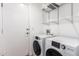 Bright laundry room with washer and dryer at 428 N Mahogany Ct, Gilbert, AZ 85233