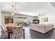 Bright dining area with a table for four and access to the living room at 4809 N 78Th Pl, Scottsdale, AZ 85251