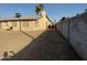 Large backyard with a block wall and sparse vegetation at 4830 S 22Nd Pl, Phoenix, AZ 85040
