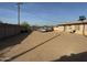 Large backyard area with a block wall and minimal landscaping at 4830 S 22Nd Pl, Phoenix, AZ 85040