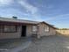 Front view of a single-story house with a walkway and landscaping at 4830 S 22Nd Pl, Phoenix, AZ 85040