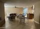 Combined kitchen and living area with a kitchen island at 4830 S 22Nd Pl, Phoenix, AZ 85040