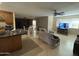 Living room with tiled floors and comfy seating at 4830 S 22Nd Pl, Phoenix, AZ 85040