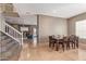 Elegant dining room with a wood table and six chairs, overlooking Gathering room at 497 N Superstition Blvd, Chandler, AZ 85225