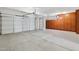 Spacious two-car garage with built-in cabinets and ample storage at 6025 E Palomino Ln, Scottsdale, AZ 85266