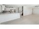Modern kitchen with white cabinets and a breakfast bar at 6025 E Palomino Ln, Scottsdale, AZ 85266