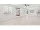 Spacious living room with tile floors and built-in shelving at 6025 E Palomino Ln, Scottsdale, AZ 85266