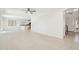 Open living area with tile floors and access to kitchen at 6025 E Palomino Ln, Scottsdale, AZ 85266