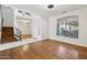 Open living room with hardwood floors and a staircase at 6025 E Palomino Ln, Scottsdale, AZ 85266