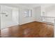 Open loft area with wood flooring and views to lower level at 6025 E Palomino Ln, Scottsdale, AZ 85266
