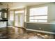 Dining area with tile flooring and access to backyard at 7 N 87Th Dr, Tolleson, AZ 85353