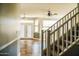 Bright entryway with tile flooring and staircase at 7 N 87Th Dr, Tolleson, AZ 85353