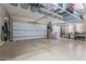 Garage with overhead storage and work area at 7278 E La Junta Rd, Scottsdale, AZ 85255