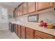 Laundry room with ample counter and cabinet space at 7278 E La Junta Rd, Scottsdale, AZ 85255