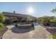 Backyard pool area with a water feature and extensive stonework at 7278 E La Junta Rd, Scottsdale, AZ 85255