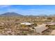 Aerial view of property with desert landscape in background at 7332 E Highland Rd, Cave Creek, AZ 85331