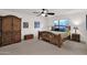 Main bedroom with wooden furniture and ceiling fan at 7332 E Highland Rd, Cave Creek, AZ 85331