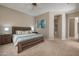 Spacious Primary bedroom with ensuite bathroom access at 7445 E Eagle Crest Dr # 1006, Mesa, AZ 85207