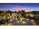 Stunning desert landscape surrounds this beautiful home at dusk at 8124 E Paraiso Dr, Scottsdale, AZ 85255
