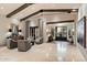 Spacious living room with high ceilings, exposed beams, and comfortable seating at 8124 E Paraiso Dr, Scottsdale, AZ 85255
