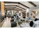 Open-concept living space with a large sectional sofa and fireplace at 8124 E Paraiso Dr, Scottsdale, AZ 85255