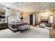 Luxurious main bedroom with fireplace and access to backyard at 8124 E Paraiso Dr, Scottsdale, AZ 85255