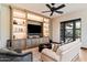 Entertainment area with built-in shelving and comfortable seating at 8124 E Paraiso Dr, Scottsdale, AZ 85255