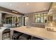 Outdoor kitchen with sink, countertop, and built-in grill at 8124 E Paraiso Dr, Scottsdale, AZ 85255