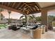 Spacious patio with comfortable seating and views of the backyard at 8124 E Paraiso Dr, Scottsdale, AZ 85255
