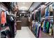 Spacious Primary closet with ample built-in shelving and hanging space at 8124 E Paraiso Dr, Scottsdale, AZ 85255