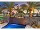 Fire feature and water wall in desert setting at 8124 E Paraiso Dr, Scottsdale, AZ 85255