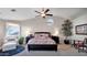 Relaxing main bedroom with a ceiling fan and plenty of natural light at 8638 E Dahlia Dr, Scottsdale, AZ 85260