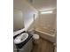 Clean bathroom with tub/shower combo and dark vanity at 8832 E Pueblo Ave # 29, Mesa, AZ 85208