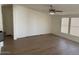 Bright living room with light walls and wood-look flooring at 8832 E Pueblo Ave # 29, Mesa, AZ 85208