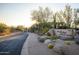 Elegant community entrance sign with lush desert landscaping at The Ridge at Troon North at 10260 E White Feather Ln # 1038, Scottsdale, AZ 85262