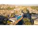 Aerial shot of a community pool area with a pool, cabana, and desert landscaping at 10260 E White Feather Ln # 1038, Scottsdale, AZ 85262