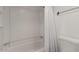 Bathroom with tub shower combination and white fixtures at 10610 S 48Th St # 2096, Phoenix, AZ 85044