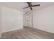 Spacious bedroom with neutral carpeting and access to the kitchen at 10610 S 48Th St # 2096, Phoenix, AZ 85044