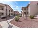 Landscaped community walkway with desert landscaping at 10610 S 48Th St # 2096, Phoenix, AZ 85044