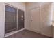 Private patio with sliding glass doors and storage closet at 10610 S 48Th St # 2096, Phoenix, AZ 85044