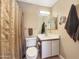 Clean bathroom with shower/tub combo and updated vanity at 11422 W Pinehollow Dr, Surprise, AZ 85378