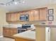 Kitchen with stainless steel appliances and granite countertops at 11422 W Pinehollow Dr, Surprise, AZ 85378