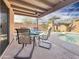 Inviting backyard oasis with a refreshing pool and patio furniture at 11422 W Pinehollow Dr, Surprise, AZ 85378