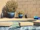 Relaxing spa with decorative pots and towels at 11422 W Pinehollow Dr, Surprise, AZ 85378