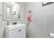 Small bathroom with white vanity and modern fixtures at 11830 W Avenida Del Sol --, Sun City, AZ 85373